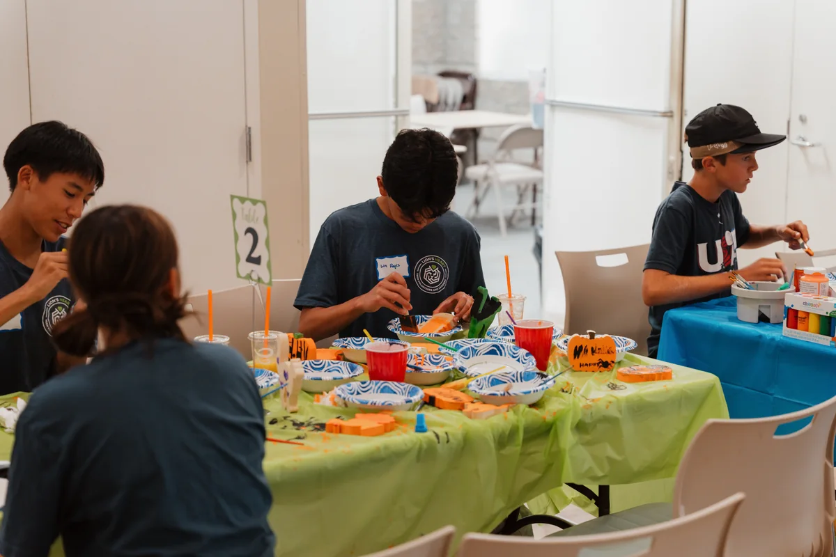 Lion’s Heart teen volunteers participating in hands-on community service. Photo by Nathan Palmer / OC Marketing Media