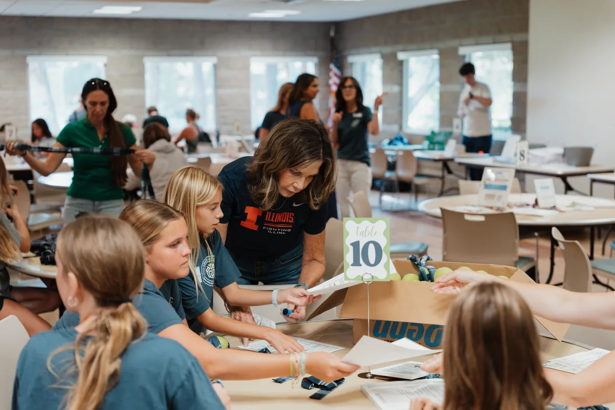 Lion’s Heart teen volunteers actively packing and preparing items for a community service project. Photo by Nathan Palmer / OC Marketing Media